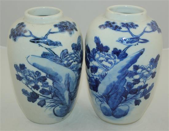 A pair of Chinese blue and white crackle glaze ovoid vases, early 20th century, 19.5cm
